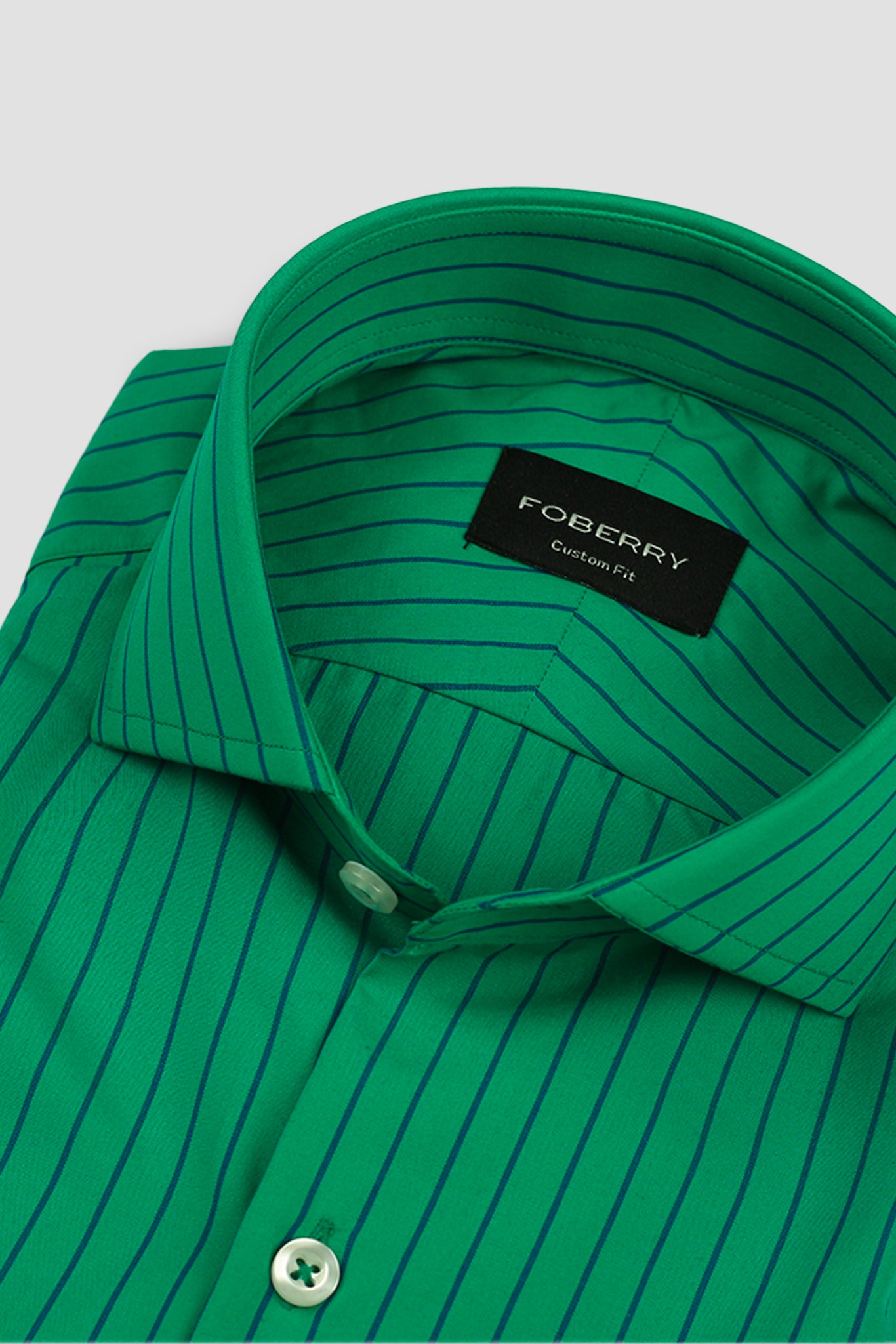 Blue Pinstripes On Green Shirt