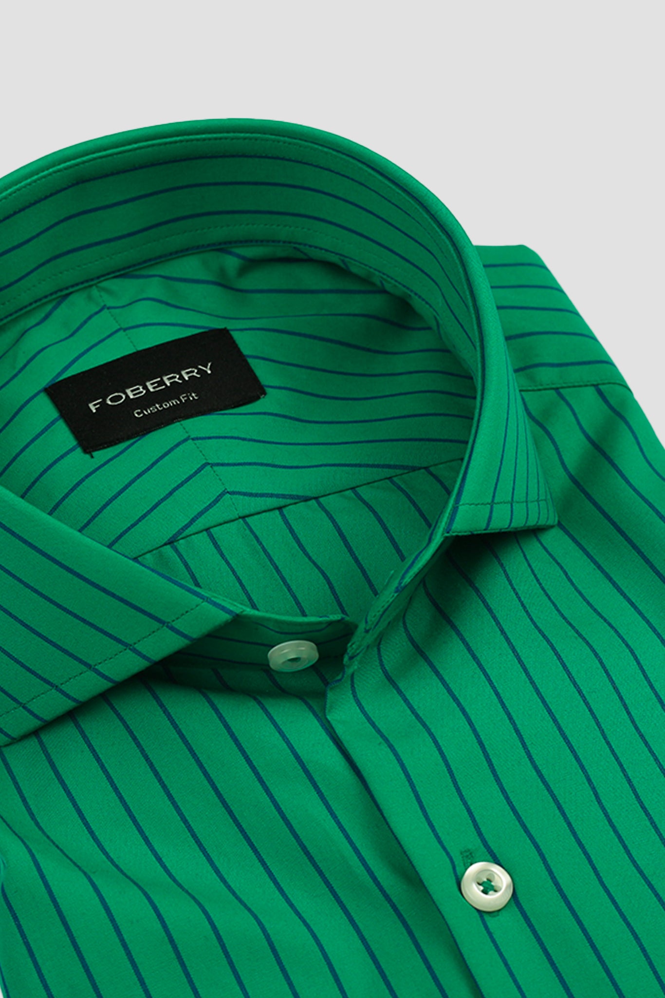 Blue Pinstripes On Green Shirt
